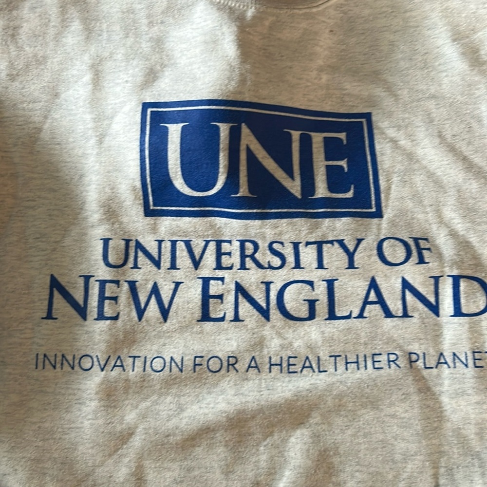 UNE crew neck University of New England gently used Champion Adult small